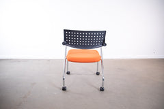 Vitra "Vis a vis Step", mit Rollen, Chrom/Orange/Schwarz